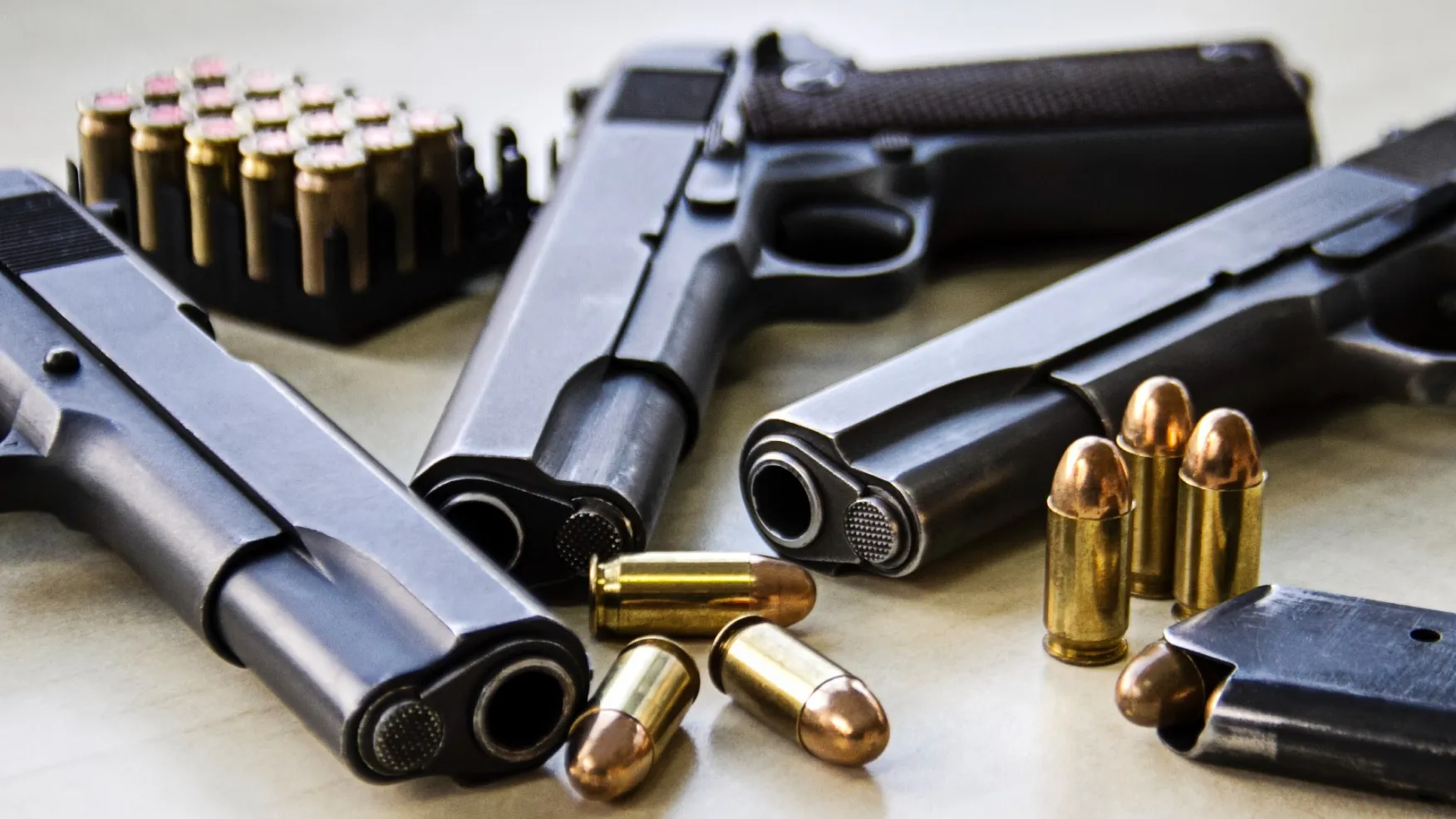 Handguns and ammunition